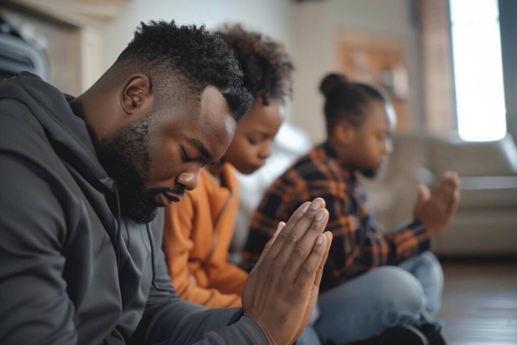 Family praying together to strengthen faith.