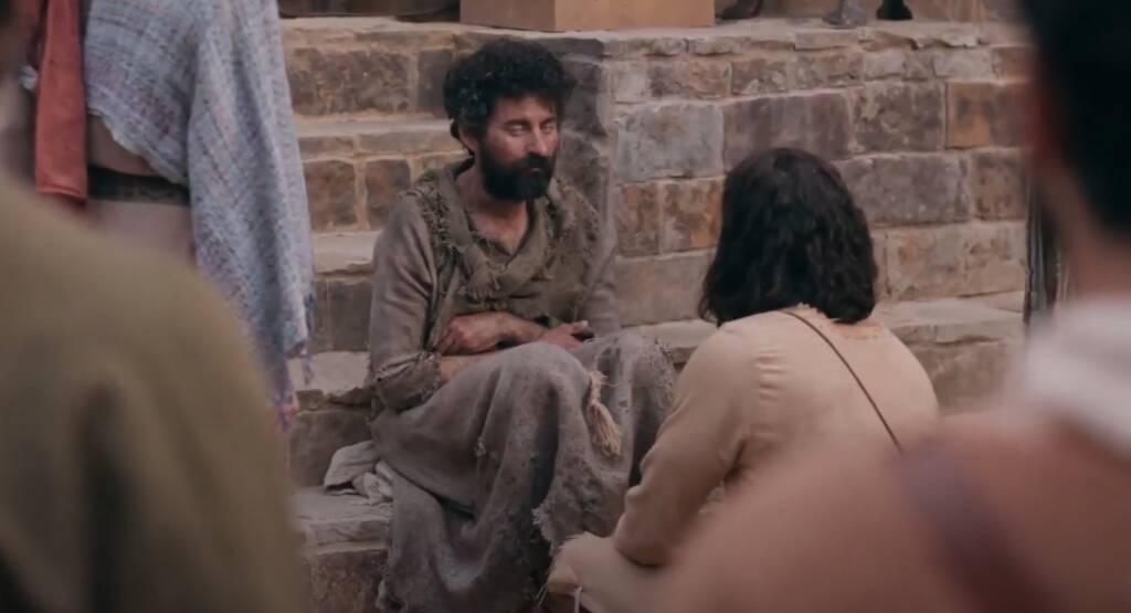 Jesus talks to the blind man
