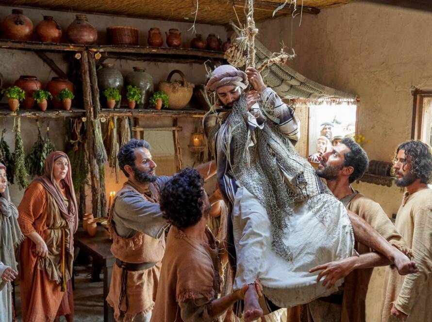 Jesus heals a paralytic man at Capernaum.